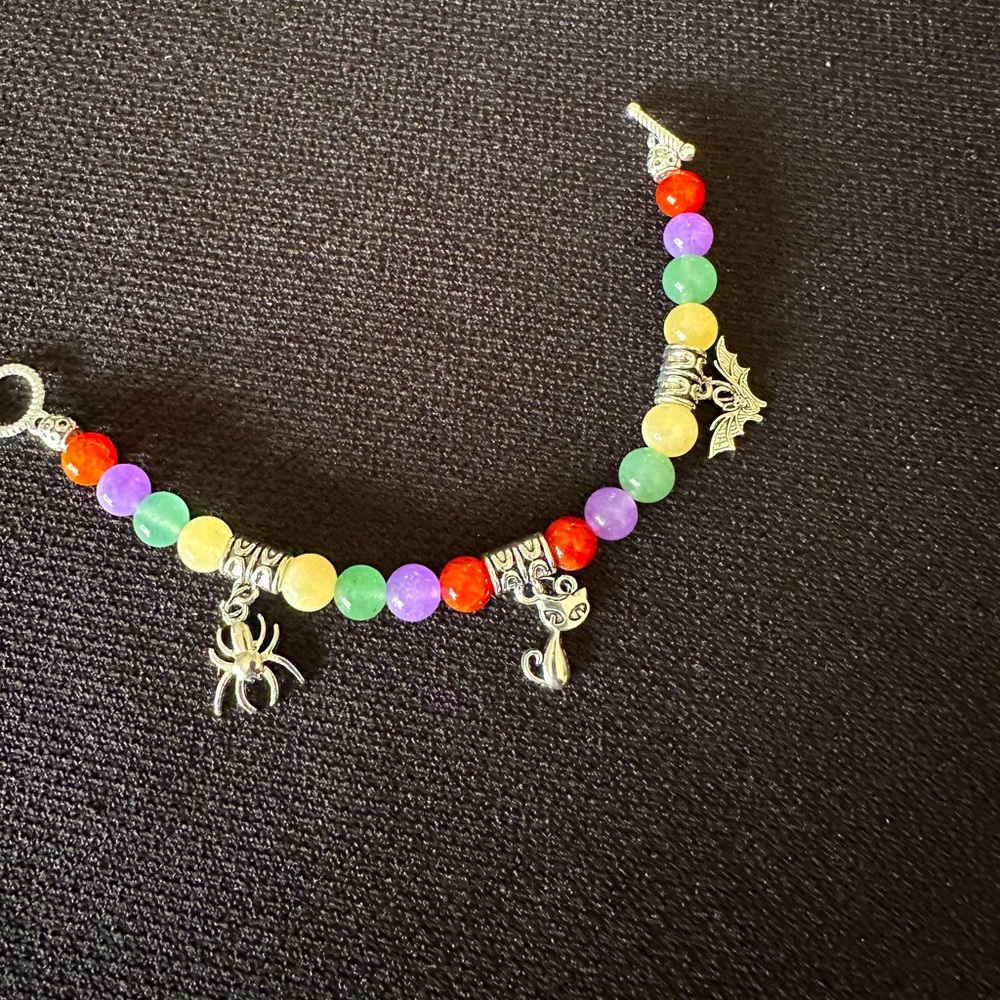 Handcrafted gemstone bracelet Halloween charms carnelian yellow jade green jade